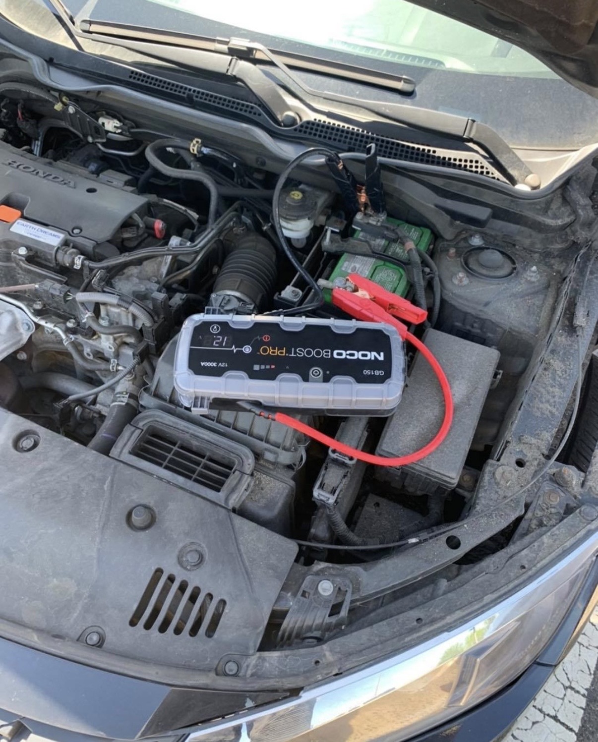 Jump starting a car battery in Atlanta